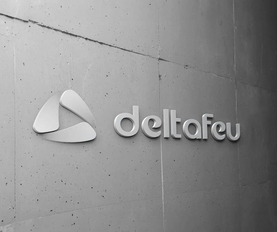 Deltafeu — Enseigne blanche en relief sur béton